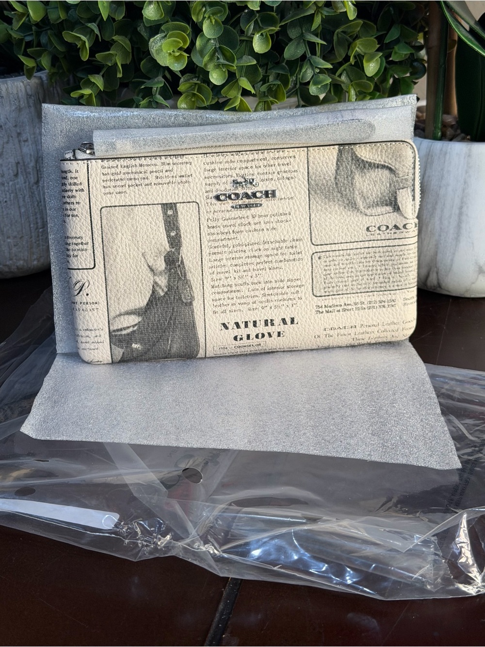 Coach Large Corner Zip Wristlet
With Newspaper Print NWT in packaging. - Picture 5 of 5